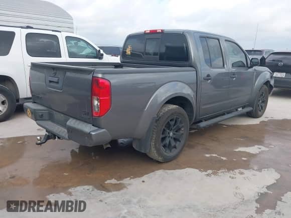 2020 Nissan Frontier SV with VIN 1N6ED0EA1LN715143, listed as a IAAI auction lot 42807807 with 87,958 mi miles and . Bid and sale history available at DreamBid. Image 4.