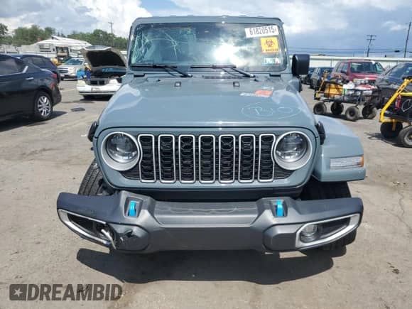 2024 Jeep Wrangler Sahara with VIN 1C4RJXP6XRW173249, listed as a Copart auction lot 61820515 with Not provided miles and Salvage title. Bid and sale history available at DreamBid. Image 5.