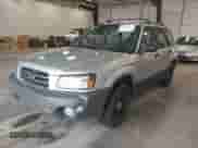 2003 Subaru Forester X with VIN JF1SG63613H771800, listed as a IAAI auction lot 42579297 with 221,992 mi miles and . Bid and sale history available at DreamBid. Image 2.