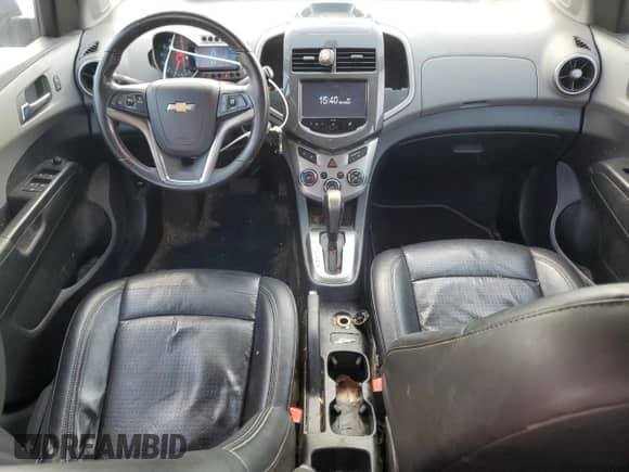 2014 Chevrolet Sonic LTZ с VIN 1G1JE6SB4E4178266, выставлен на аукционе Copart как лот 57064715 с пробегом 182 850 миль миль и Чистый • Clean title. История ставок и продаж доступна на DreamBid. Изображение 8.