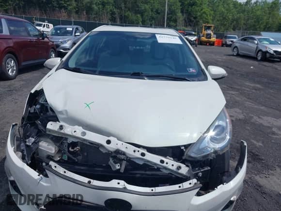 2015 Toyota Prius One z VIN JTDKDTB37F1094645, wystawiony jako IAAI lot #42779146 z przebiegiem 149 416 mil mil oraz . Historia ofert i sprzedaży dostępna na DreamBid. Obrazek 12.