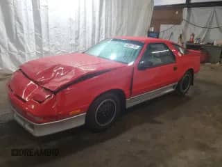 1990 Dodge Daytona with VIN 1B3XG44K3LG494199, listed as a Copart auction lot 60997765 with 68,533 mi miles and Salvage title. Bid and sale history available at DreamBid. Image 1.