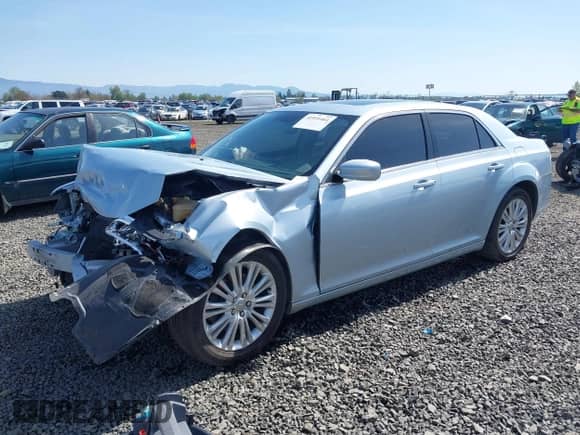 2013 Chrysler 300 with VIN 2C3CCARG0DH592063, listed as a IAAI auction lot 41931461 with 74,965 mi miles and . Bid and sale history available at DreamBid. Image 2.