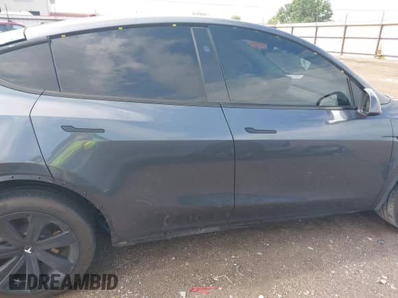 2023 Tesla Model Y Long Range with VIN 7SAYGDEE4PA202135, listed as a IAAI auction lot 42975478 with 27,065 mi miles and . Bid and sale history available at DreamBid. Image 14.