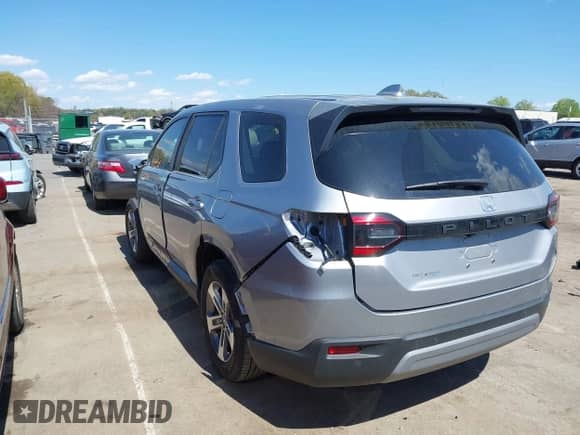 2024 Honda Pilot EX-L with VIN 5FNYG2H43RB014538, listed as a IAAI auction lot 41860132 with 24,303 mi miles and . Bid and sale history available at DreamBid. Image 3.
