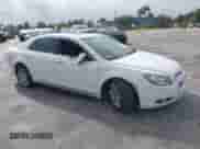 2012 Chevrolet Malibu LTZ 1LZ z VIN 1G1ZE5E0XCF152134, wystawiony jako IAAI lot #42427720 z przebiegiem 143 794 mil mil oraz . Historia ofert i sprzedaży dostępna na DreamBid. Obrazek 1.