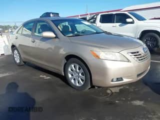 2007 Toyota Camry XLE z VIN 4T1BK46K37U548950, wystawiony jako IAAI lot #43350761 z przebiegiem 129 186 mil mil oraz . Historia ofert i sprzedaży dostępna na DreamBid. Obrazek 1.