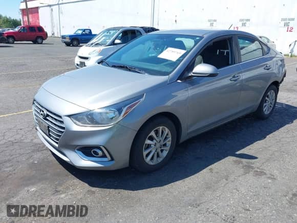 2022 Hyundai Accent SE z VIN 3KPC24A67NE156021, wystawiony jako IAAI lot #42789769 z przebiegiem 74 618 mil mil oraz . Historia ofert i sprzedaży dostępna na DreamBid. Obrazek 2.