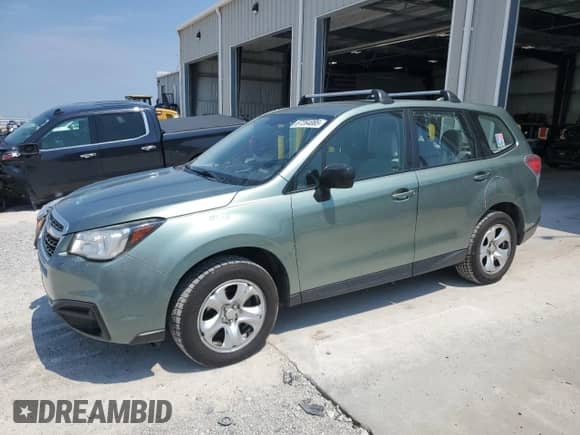 2017 Subaru Forester with VIN JF2SJAACXHG457987, listed as a Copart auction lot 67264085 with 136,942 mi miles and Salvage title. Bid and sale history available at DreamBid. Image 1.