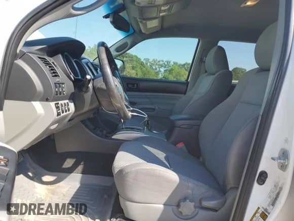 2013 Toyota Tacoma z VIN 5TFLU4EN0DX062427, wystawiony jako Copart lot #80718785 z przebiegiem 186 742 mil mil oraz Szkoda całkowita • Salvage title. Historia ofert i sprzedaży dostępna na DreamBid. Obrazek 7.