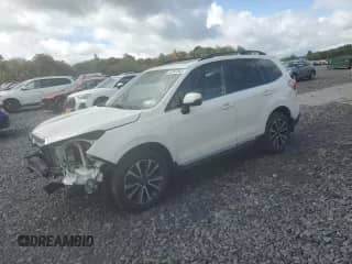 2017 Subaru Forester Touring z VIN JF2SJGWC0HH452397, wystawiony jako Copart lot #82097685 z przebiegiem 70 097 mil mil oraz Szkoda całkowita • Salvage title. Historia ofert i sprzedaży dostępna na DreamBid. Obrazek 1.
