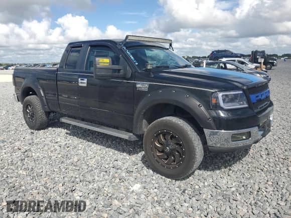 2005 Ford F-150 XLT with VIN 1FTPX12595FB26709, listed as a Copart auction lot 82368815 with 162,849 mi miles and Salvage title. Bid and sale history available at DreamBid. Image 4.