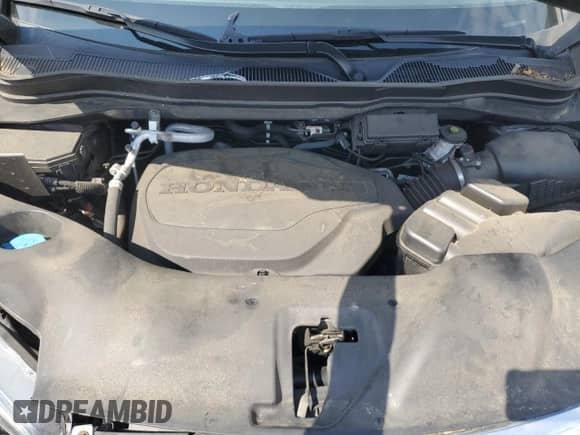 2022 Honda Pilot EX-L with VIN 5FNYF6H58NB020414, listed as a Copart auction lot 67414035 with 68,792 mi miles and Salvage title. Bid and sale history available at DreamBid. Image 12.