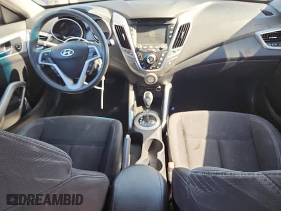 2014 Hyundai Veloster с VIN KMHTC6AD2EU208305, выставлен на аукционе Copart как лот 81756115 с пробегом Не указан миль и Списание • Salvage title. История ставок и продаж доступна на DreamBid. Изображение 8.
