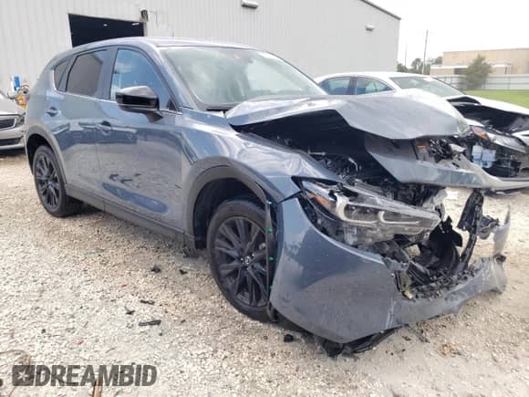 2025 Mazda CX-5 S Carbon Edition z VIN JM3KFBCM7S0681298, wystawiony jako Copart lot #69565385 z przebiegiem 9 552 mil mil oraz Czysty tytuł • Clean title. Historia ofert i sprzedaży dostępna na DreamBid. Obrazek 4.