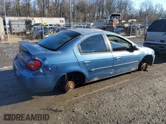 2003 Dodge Neon SXT with VIN 1B3ES56C93D140657, listed as a Copart auction lot 86829224 with 196,870 mi miles and Salvage title. Bid and sale history available at DreamBid. Image 3.