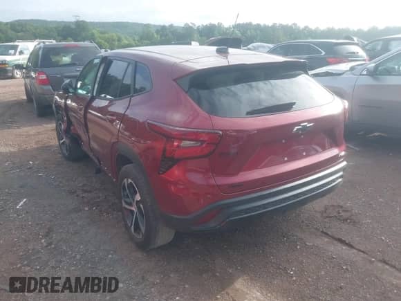 2024 Chevrolet Trax 1RS with VIN KL77LGE27RC173547, listed as a IAAI auction lot 42777228 with 29,858 mi miles and . Bid and sale history available at DreamBid. Image 3.
