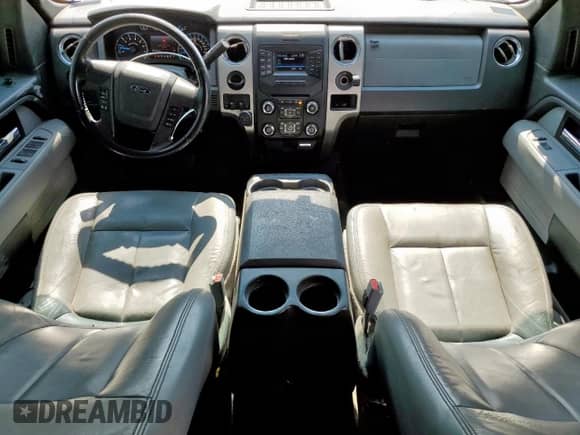 2014 Ford F-150 XLT with VIN 1FTFW1CF1EFA43720, listed as a Copart auction lot 81579185 with 187,421 mi miles and Salvage title. Bid and sale history available at DreamBid. Image 8.