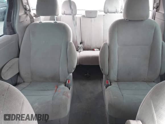 2016 Toyota Sienna L with VIN 5TDZK3DC0GS718601, listed as a IAAI auction lot 42649578 with 221,464 mi miles and . Bid and sale history available at DreamBid. Image 8.