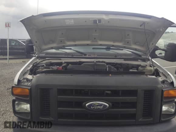 2012 Ford Econoline Cargo Commercial with VIN 1FTNE1EW0CDA89656, listed as a IAAI auction lot 42579010 with 204,112 mi miles and . Bid and sale history available at DreamBid. Image 10.