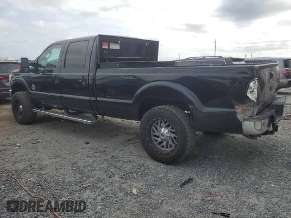2012 Ford F-250 XL with VIN 1FT7W2BT2CEA95605, listed as a Copart auction lot 54438605 with 176,789 mi miles and Salvage title. Bid and sale history available at DreamBid. Image 2.