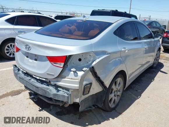 2012 Hyundai Elantra GLS with VIN KMHDH4AE7CU281749, listed as a IAAI auction lot 42748994 with 153,669 mi miles and . Bid and sale history available at DreamBid. Image 4.