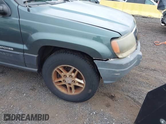2003 Jeep Grand Cherokee Laredo with VIN 1J4GW48S23C610697, listed as a IAAI auction lot 43178617 with 227,331 mi miles and . Bid and sale history available at DreamBid. Image 6.