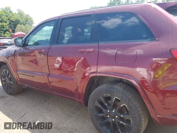 2017 Jeep Grand Cherokee Altitude with VIN 1C4RJFAG3HC727548, listed as a IAAI auction lot 42915702 with 136,551 mi miles and . Bid and sale history available at DreamBid. Image 15.