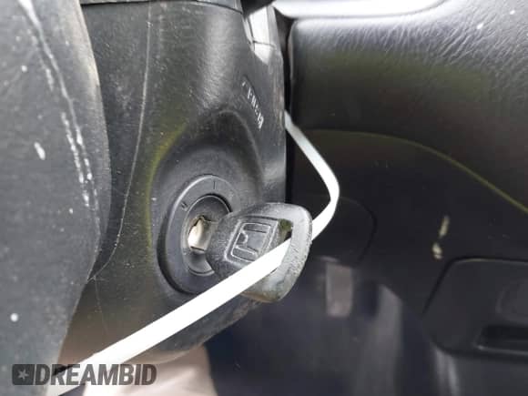 2002 Honda Civic with VIN 1HGEM21222L066980, listed as a IAAI auction lot 41952740 with 68,818 mi miles and . Bid and sale history available at DreamBid. Image 11.