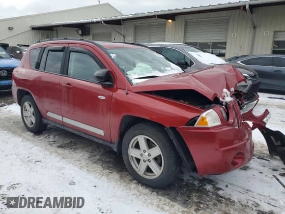 2010 Jeep Compass Latitude z VIN 1J4NF1FB0AD623710, wystawiony jako Copart lot #88657615 z przebiegiem Nie podano mil oraz Szkoda całkowita • Salvage title. Historia ofert i sprzedaży dostępna na DreamBid. Obrazek 4.