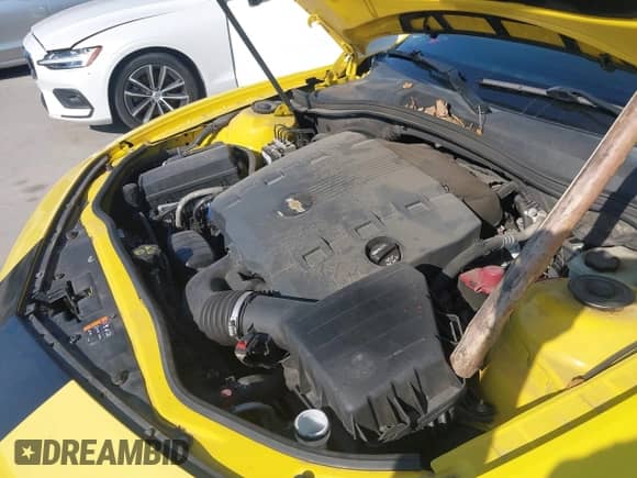 2013 Chevrolet Camaro LT z VIN 2G1FC1E32D9195534, wystawiony jako IAAI lot #43415240 z przebiegiem 199 934 mil mil oraz . Historia ofert i sprzedaży dostępna na DreamBid. Obrazek 10.