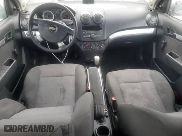 2011 Chevrolet Aveo 1LT с VIN KL1TD5DE6BB138998, выставлен на аукционе Copart как лот 70659064 с пробегом 51 388 миль миль и Списание • Salvage title. История ставок и продаж доступна на DreamBid. Изображение 8.