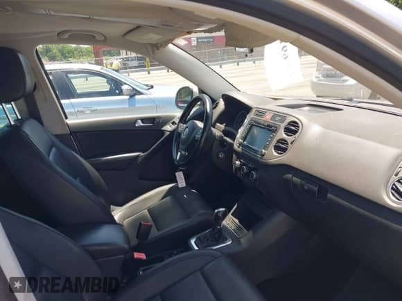 2011 Volkswagen Tiguan S with VIN WVGAV7AXXBW511253, listed as a IAAI auction lot 42569188 with 154,229 mi miles and . Bid and sale history available at DreamBid. Image 5.