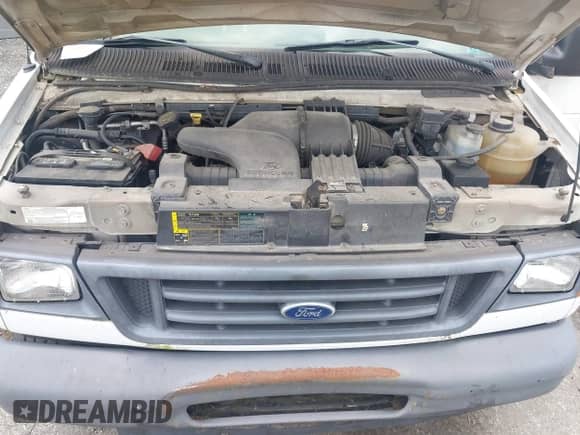 2006 Ford Econoline Cargo with VIN 1FTNE24W06DA77101, listed as a IAAI auction lot 42740817 with 196,854 mi miles and . Bid and sale history available at DreamBid. Image 10.