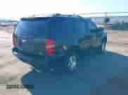 2009 Chevrolet Tahoe 2LT with VIN 1GNFK23079R260424, listed as a IAAI auction lot 43026277 with 253,109 mi miles and . Bid and sale history available at DreamBid. Image 4.