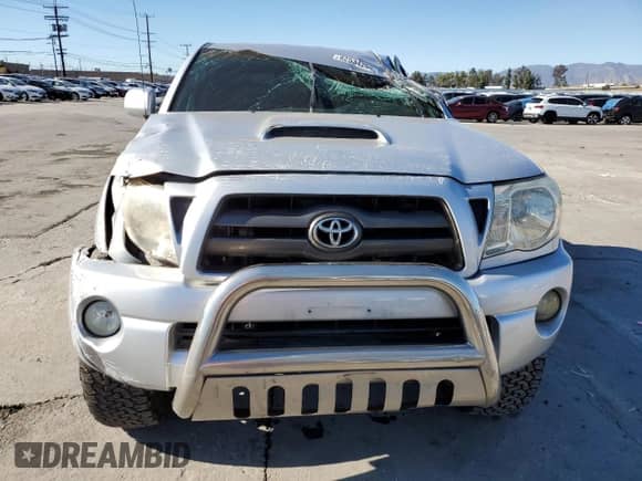 2007 Toyota Tacoma с VIN 5TELU42N27Z396041, выставлен на аукционе Copart как лот 82534205 с пробегом Не указан миль и Списание • Salvage title. История ставок и продаж доступна на DreamBid. Изображение 5.