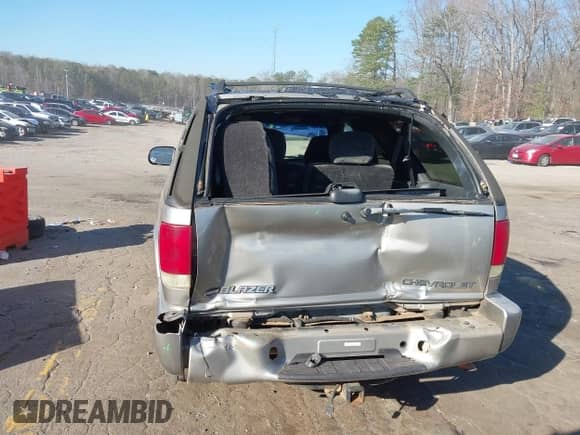 2002 Chevrolet Blazer LS с VIN 1GNCS18W12K145228, выставлен на аукционе IAAI как лот 41653692 с пробегом 213 764 миль миль и . История ставок и продаж доступна на DreamBid. Изображение 6.