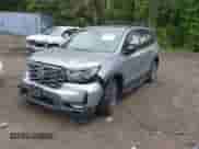 2023 Honda Passport TrailSport z VIN 5FNYF8H66PB024923, wystawiony jako IAAI lot #42243780 z przebiegiem 14 358 mil mil oraz . Historia ofert i sprzedaży dostępna na DreamBid. Obrazek 2.