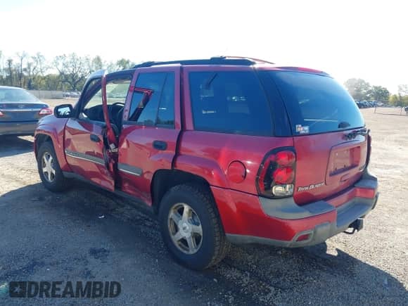 2002 Chevrolet TrailBlazer LS with VIN 1GNDT13S822523955, listed as a IAAI auction lot 43435441 with 143,193 mi miles and . Bid and sale history available at DreamBid. Image 3.