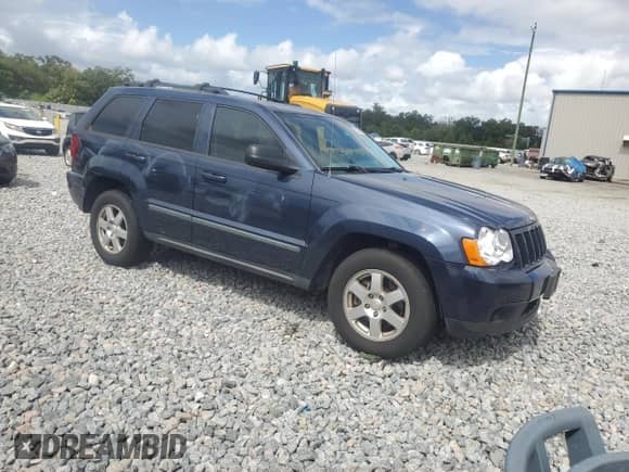 2009 Jeep Grand Cherokee Laredo with VIN 1J8GR48K79C509461, listed as a Copart auction lot 85326715 with 178,870 mi miles and Salvage title. Bid and sale history available at DreamBid. Image 4.