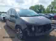 2016 Honda Odyssey Touring Elite z VIN 5FNRL5H97GB034558, wystawiony jako IAAI lot #42862918 z przebiegiem 118 891 mil mil oraz . Historia ofert i sprzedaży dostępna na DreamBid. Obrazek 1.