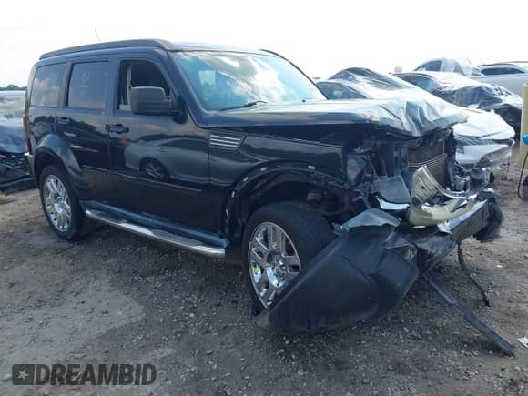 2011 Dodge Nitro Heat with VIN 1D4PU4GK8BW537638, listed as a IAAI auction lot 42669447 with Not provided miles and . Bid and sale history available at DreamBid. Image 1.