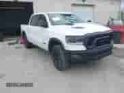 2022 Ram 1500 Rebel z VIN 1C6SRFLT1NN267513, wystawiony jako IAAI lot #41961821 z przebiegiem 140 488 mil mil oraz . Historia ofert i sprzedaży dostępna na DreamBid. Obrazek 1.