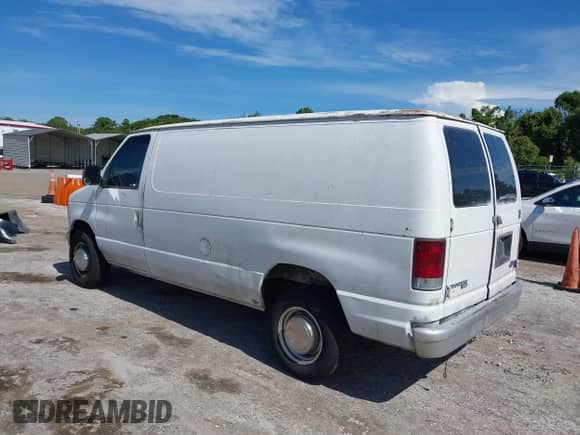 1996 Ford Econoline Cargo with VIN 1FTFE24Y9THB01647, listed as a IAAI auction lot 42990641 with 312,069 mi miles and . Bid and sale history available at DreamBid. Image 3.