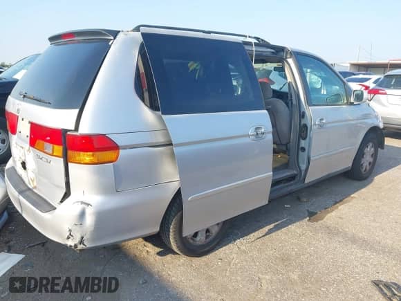 2002 Honda Odyssey EX с VIN 2HKRL18622H529775, выставлен на аукционе IAAI как лот 43034668 с пробегом 178 858 миль миль и . История ставок и продаж доступна на DreamBid. Изображение 4.