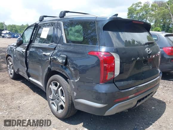 2024 Hyundai Palisade SEL z VIN KM8R4DGE1RU776840, wystawiony jako IAAI lot #42692147 z przebiegiem 10 507 mil mil oraz . Historia ofert i sprzedaży dostępna na DreamBid. Obrazek 3.