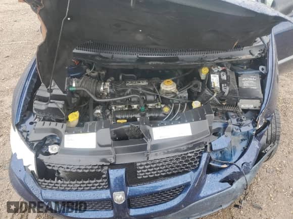 2002 Dodge Caravan with VIN 1B4GP25R12B704306, listed as a Copart auction lot 57871685 with 181,234 mi miles and Salvage title. Bid and sale history available at DreamBid. Image 12.