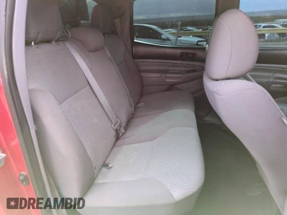 2013 Toyota Tacoma z VIN 3TMLU4EN9DM109881, wystawiony jako Copart lot #65328175 z przebiegiem 209 951 mil mil oraz Szkoda całkowita • Salvage title. Historia ofert i sprzedaży dostępna na DreamBid. Obrazek 10.