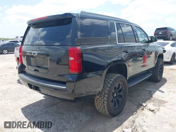 2018 Chevrolet Tahoe LT z VIN 1GNSCBKC9JR133640, wystawiony jako IAAI lot #42542381 z przebiegiem 130 154 mil mil oraz . Historia ofert i sprzedaży dostępna na DreamBid. Obrazek 4.