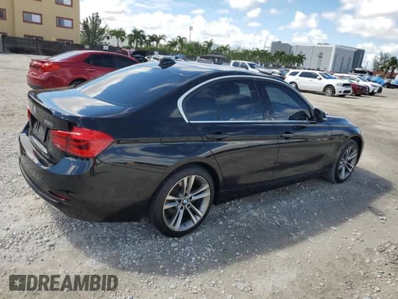 2018 BMW 3 Series 330i with VIN WBA8B9G57JNU95883, listed as a Copart auction lot 85360465 with 105,990 mi miles and Salvage title. Bid and sale history available at DreamBid. Image 3.